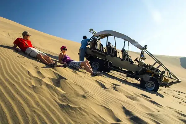 people doing sanboarding in lima peru